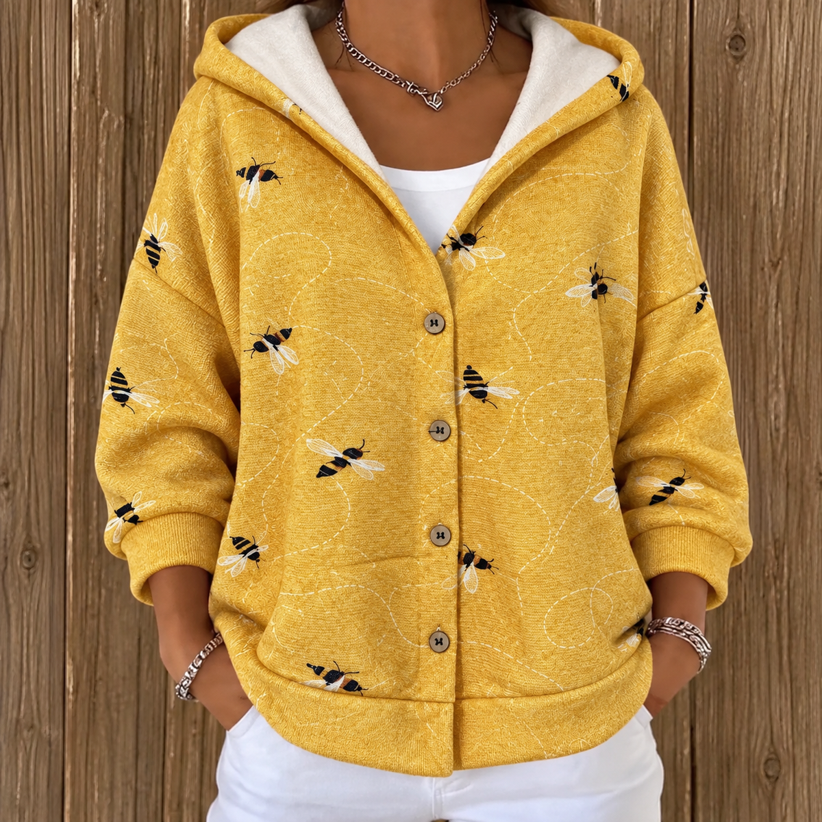 Eveline | Damen Strickjacke mit Kapuze, Knöpfen und Blumen Design