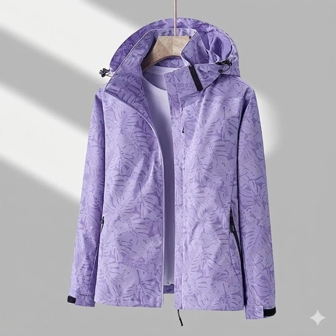 Miriam | Damen Wasserdichte Regenjacke mit Kapuze, Langer Schnitt und Muster Optik